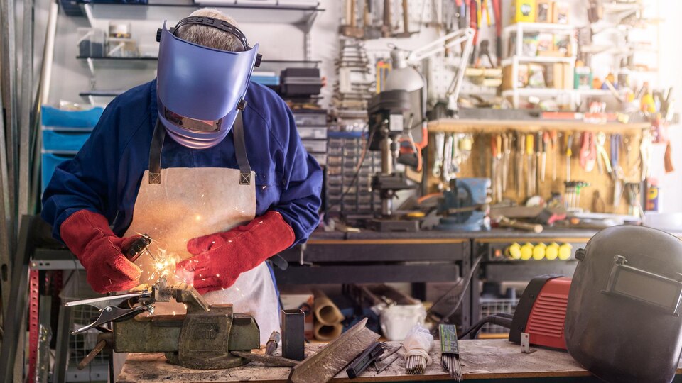 20230712085501_[fpdl.in]_skillful-metal-worker-working-with-arc-welding-machine-factory-sparks-fly_352173-4022_large