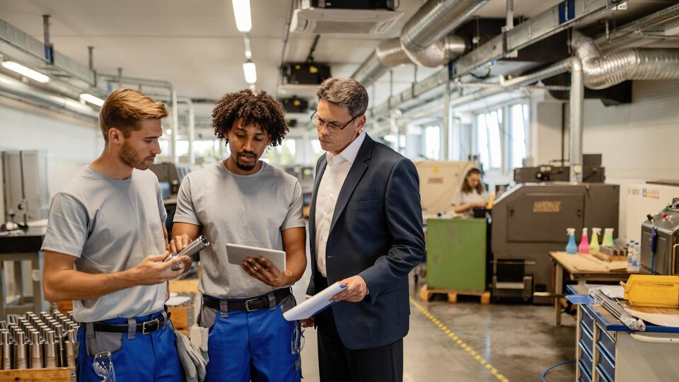20230725172503_[fpdl.in]_mid-adult-manager-two-metal-workers-cooperating-while-analzying-finished-steel-product-using-digital-tablet-industrial-building_637285-4096_large